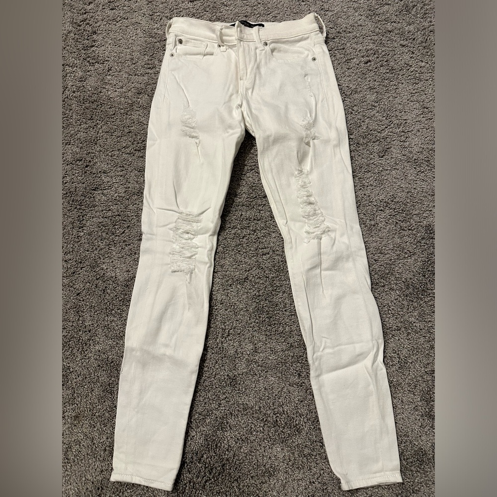 Very Distressed White Denim